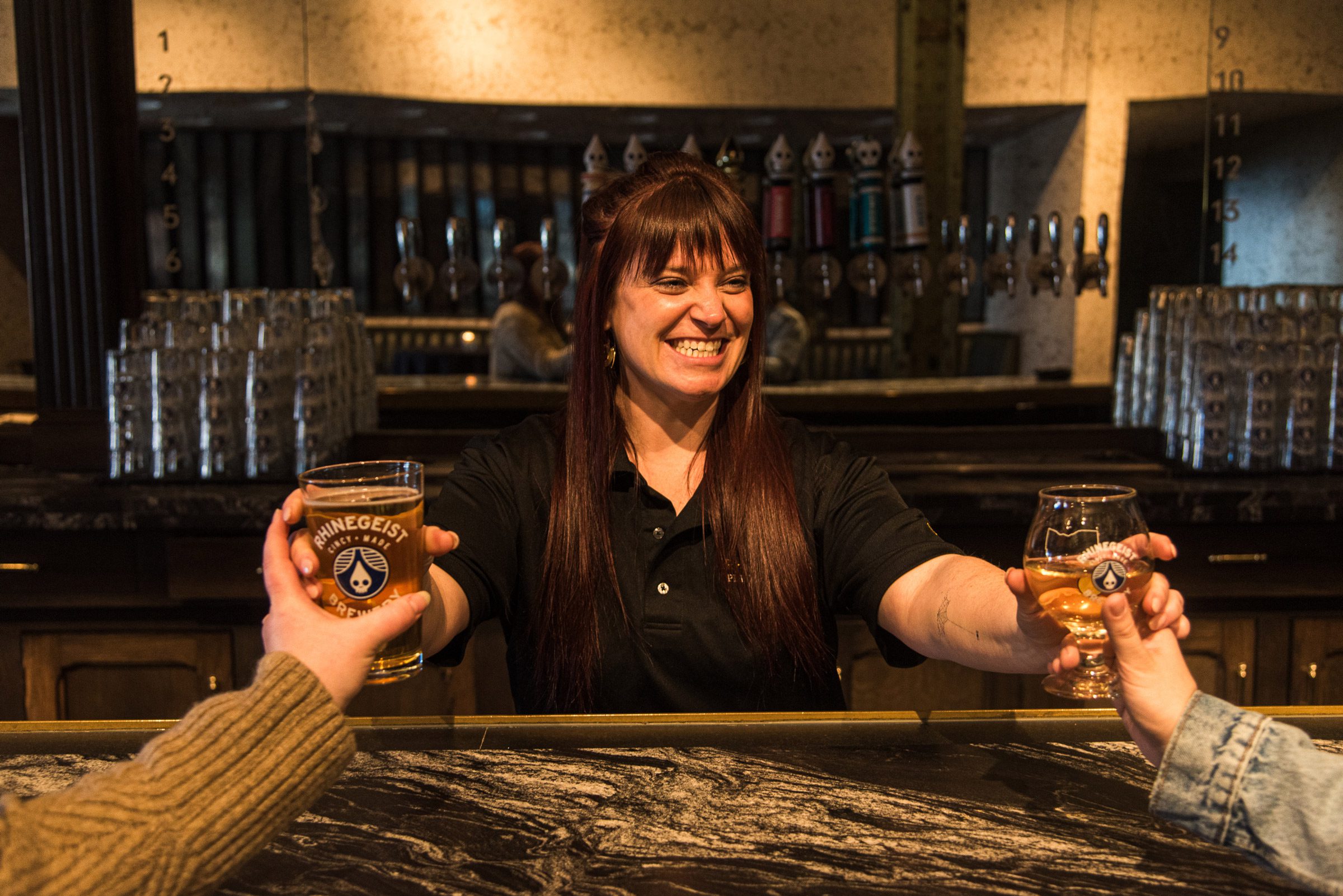 hospitality worker serving at rhinegiest